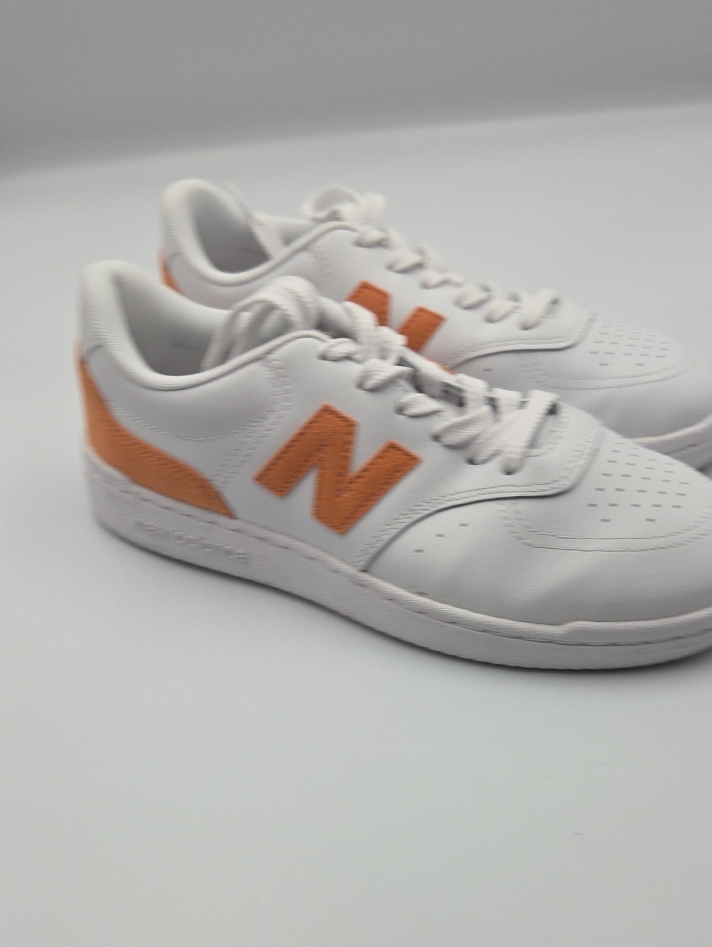 New Balance White Sneakers with Orange Accents